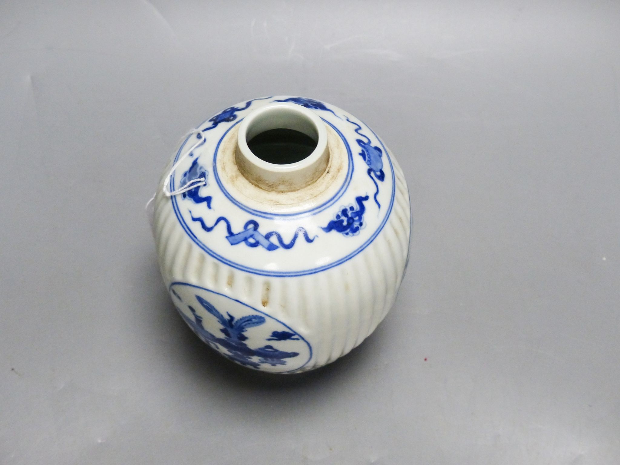 A Chinese blue and white fluted jar, 15cm